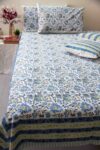 Blue and white block printed floral bedsheet with pillow covers