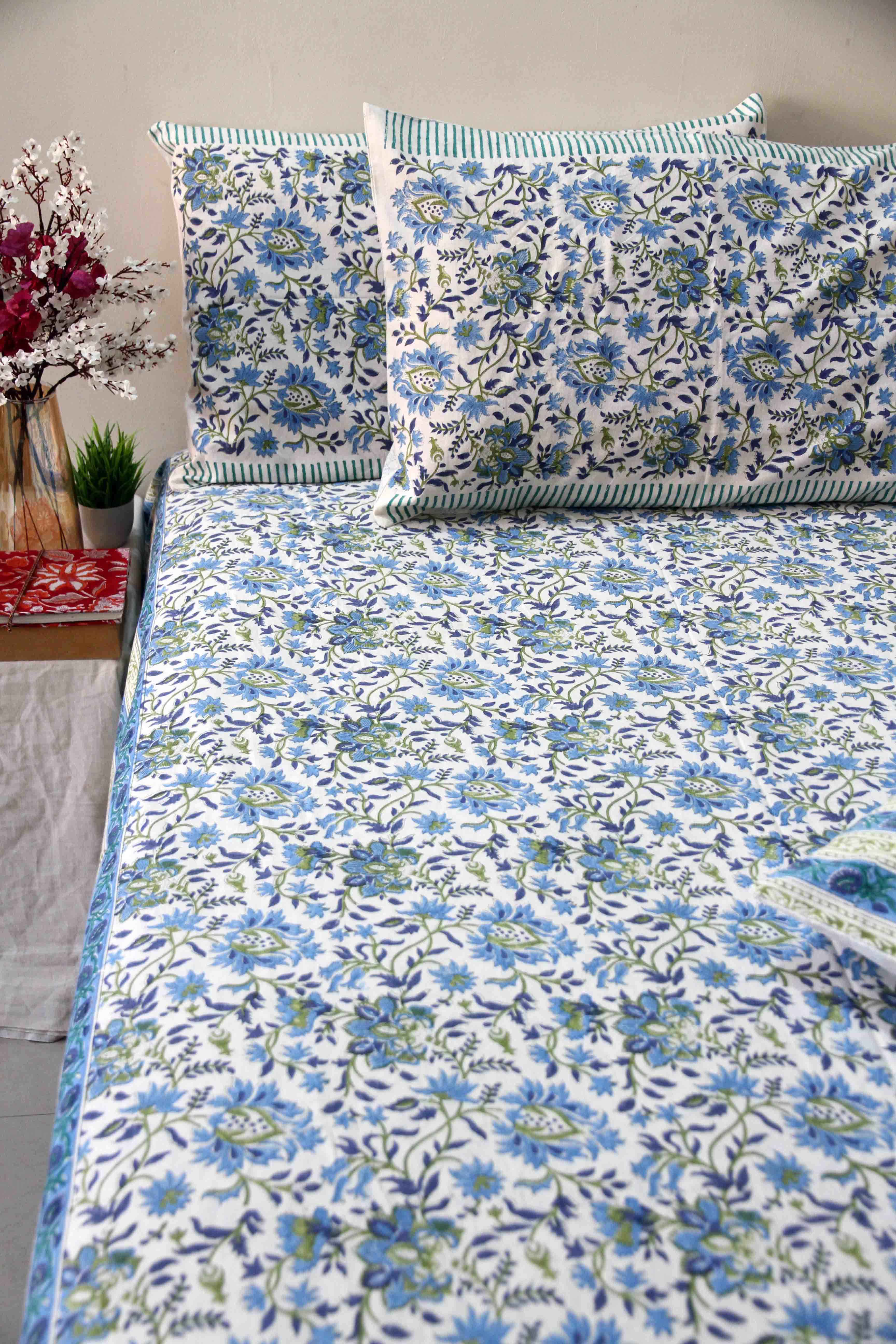 Blue and white block printed floral bedsheet with pillow covers