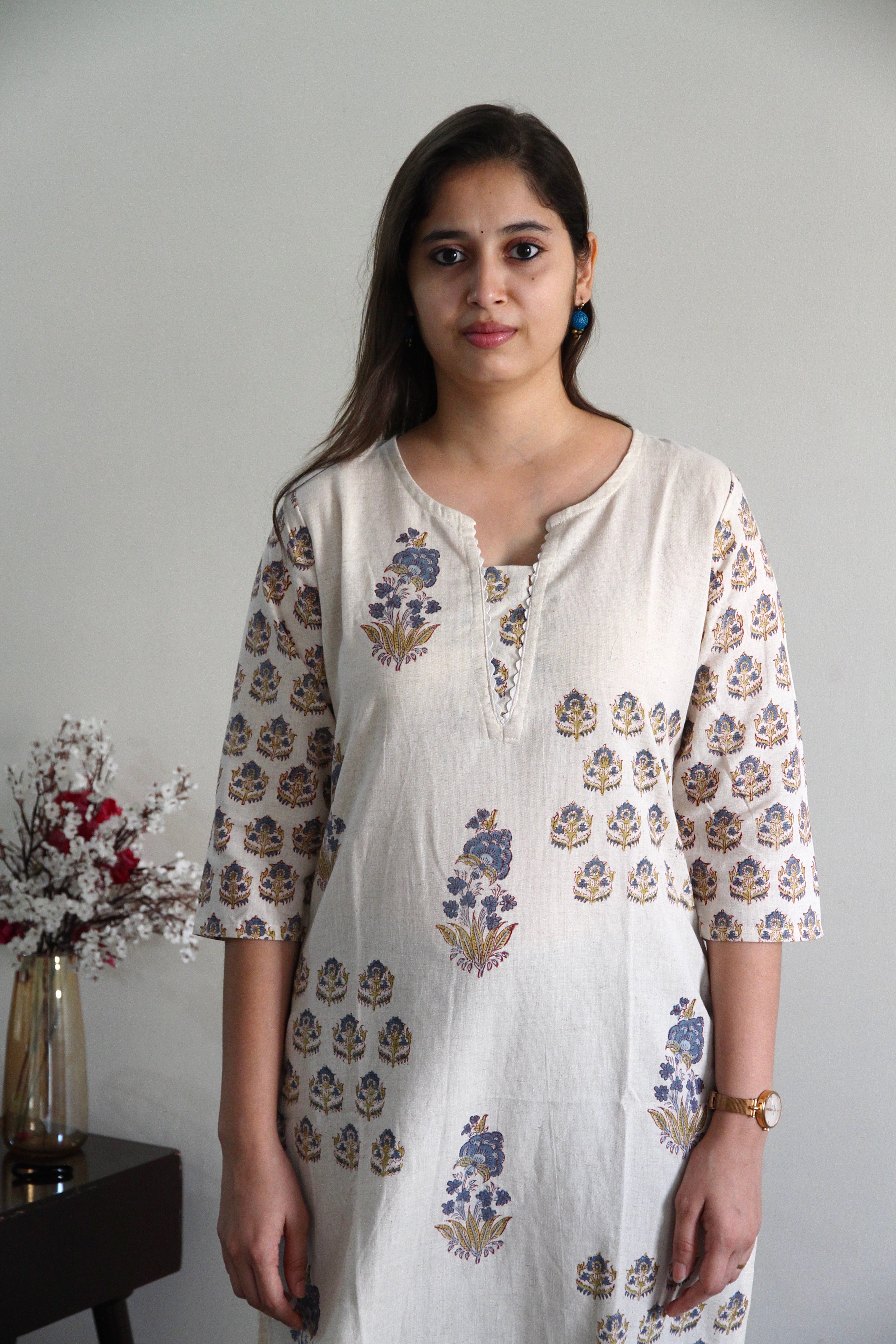 Off-white_cotton_straight_kurta_with_buta_and_buti_placement_hand_block_print_in_blue_with_a_lace_detailing_V_neckline