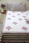 White and pink block printed cotton bedsheet with pillow covers