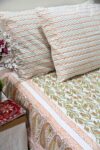 orange and green floral block printed cotton bedsheet with pillow covers