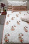orange and white floral block printed cotton bedsheet with pillow covers